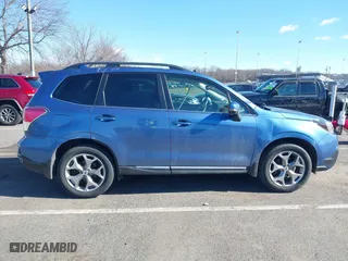 2018 Subaru Forester Touring with VIN JF2SJAWCXJH467976, listed as a IAAI auction lot 41744472 with 98,919 mi miles. Bid and sale history available at carsss.com. Image 13.