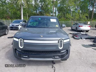 2022 Rivian R1T Launch Edition with VIN 7FCTGAAL9NN004060, listed as a IAAI auction lot 41637884 with 40,268 mi miles. Bid and sale history available at carsss.com. Image 13.