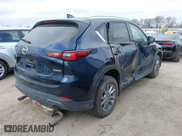 2023 Mazda CX-5 S Carbon Edition z VIN JM3KFBCM4P0288155, wystawiony jako IAAI lot #41501030 z przebiegiem 26 516 mil mil oraz . Historia ofert i sprzedaży dostępna na DreamBid. Obrazek 4.