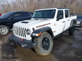 2023 Jeep Gladiator Mojave with VIN 1C6JJTEG6PL575342, listed as a IAAI auction lot 41785481 with 25,093 mi miles. Bid and sale history available at carsss.com. Image 2.