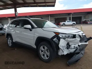 2019 Toyota RAV4 XLE with VIN JTMW1RFV0KD026561, listed as a IAAI auction lot 42035063 with 51,670 mi miles. Bid and sale history available at carsss.com. Image 1.
