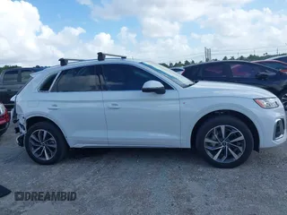 2023 Audi Q5 S line Premium Plus z VIN WA1EAAFY7P2111157, wystawiony jako IAAI lot #41953269 z przebiegiem 14 311 mil mil oraz . Historia ofert i sprzedaży dostępna na DreamBid. Obrazek 14.