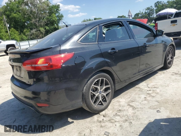 2015 Ford Focus SE с VIN 1FADP3F20FL277901, выставлен на аукционе Copart как лот 52389075 с пробегом 102 345 миль миль и Чистый • Clean title. История ставок и продаж доступна на DreamBid. Изображение 3.