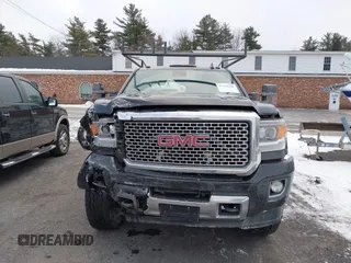 2016 GMC Sierra 2500HD Denali z VIN 1GT12UE81GF128498, wystawiony jako IAAI lot #41346398 z przebiegiem 164 532 mil mil oraz . Historia ofert i sprzedaży dostępna na DreamBid. Obrazek 12.