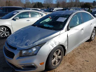 2015 Chevrolet Cruze LT with VIN 1G1PC5SBXF7123458, listed as a IAAI auction lot 41770187 with 153,477 mi miles. Bid and sale history available at carsss.com. Image 6.