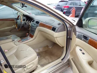 2005 Lexus ES 330 with VIN JTHBA30G855068642, listed as a IAAI auction lot 42137745 with 145,471 mi miles. Bid and sale history available at carsss.com. Image 5.