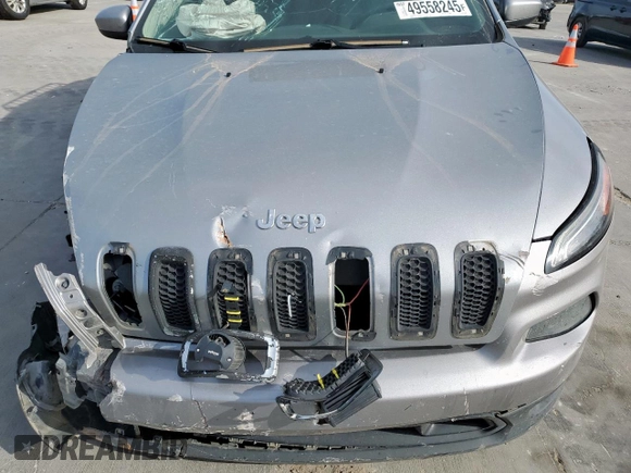 2015 Jeep Cherokee Latitude with VIN 1C4PJLCB4FW539933, listed as a Copart auction lot 49558245 with 142,828 mi miles and Salvage Title. Bid and sale history available at carsss.com. Image 12.