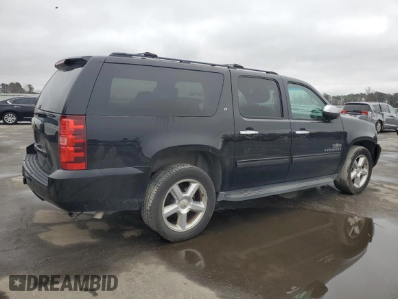 2014 Chevrolet Suburban LT with VIN 1GNSCJE05ER138819, listed as a Copart auction lot 43324175 with 218,114 mi miles and Salvage Title. Bid and sale history available at carsss.com. Image 3.