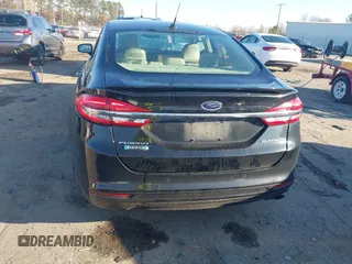 2017 Ford Fusion Titanium with VIN 3FA6P0SU2HR309895, listed as a IAAI auction lot 40963527 with 80,761 mi miles and . Bid and sale history available at DreamBid. Image 16.
