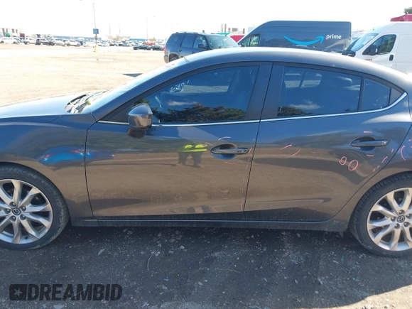 2014 Mazda 3 S Touring with VIN JM1BM1V37E1144331, listed as a IAAI auction lot 41880673 with 102,963 mi miles and . Bid and sale history available at DreamBid. Image 15.