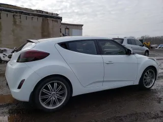 2013 Hyundai Veloster w/Black Int with VIN KMHTC6AD9DU134430, listed as a Copart auction lot 46325495 with 115,339 mi miles and Clean Title. Bid and sale history available at carsss.com. Image 3.