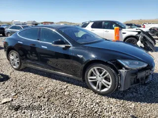 2014 Tesla Model S 60 with VIN 5YJSA1H18EFP34998, listed as a Copart auction lot 55416135 with 229,107 mi miles and Salvage title. Bid and sale history available at DreamBid. Image 4.