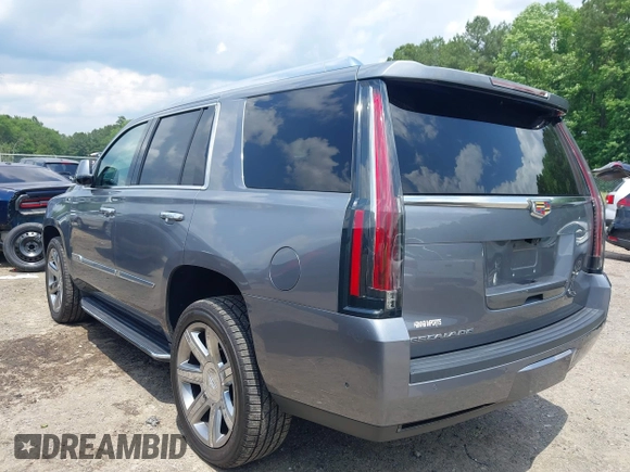 2020 Cadillac Escalade Luxury z VIN 1GYS3BKJ0LR116410, wystawiony jako IAAI lot #42274841 z przebiegiem 75 513 mil mil oraz . Historia ofert i sprzedaży dostępna na DreamBid. Obrazek 3.