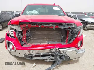 2021 GMC Sierra 1500 SLT z VIN 3GTU9DED9MG291383, wystawiony jako IAAI lot #41794666 z przebiegiem 93 457 mil mil oraz . Historia ofert i sprzedaży dostępna na DreamBid. Obrazek 6.
