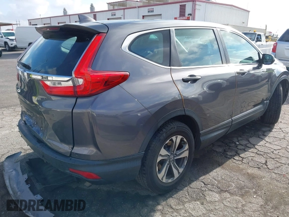 2018 Honda CR-V LX with VIN 2HKRW5H36JH426040, listed as a IAAI auction lot 42031936 with 94,564 mi miles. Bid and sale history available at carsss.com. Image 4.