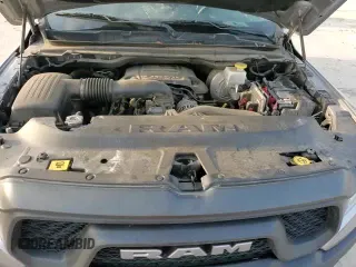 2019 Ram 1500 Rebel z VIN 1C6RRELT8KN724256, wystawiony jako Copart lot #60374605 z przebiegiem 93 137 mil mil oraz Czysty tytuł • Clean title. Historia ofert i sprzedaży dostępna na DreamBid. Obrazek 13.