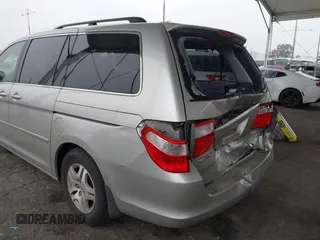 2007 Honda Odyssey EX with VIN 5FNRL38477B432832, listed as a IAAI auction lot 42153673 with 133,652 mi miles and . Bid and sale history available at DreamBid. Image 12.