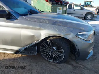2019 BMW 5 Series M550i xDrive with VIN WBAJB9C51KB464283, listed as a IAAI auction lot 41397420 with Not provided miles and . Bid and sale history available at DreamBid. Image 6.