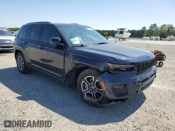 2022 Jeep Grand Cherokee Trailhawk with VIN 1C4RJYC66N8735786, listed as a Copart auction lot 52242615 with 39,626 mi miles and Salvage title. Bid and sale history available at DreamBid. Image 4.