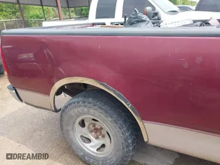 1998 Ford F-150 Standard with VIN 1FTZF1726WKB98843, listed as a IAAI auction lot 41942619 with 217,898 mi miles. Bid and sale history available at carsss.com. Image 12.
