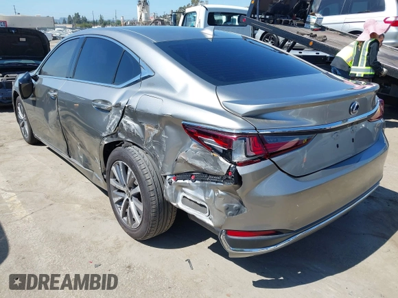 2021 Lexus ES 300h with VIN 58ACA1C1XMU007576, listed as a IAAI auction lot 42302934 with 24,614 mi miles and . Bid and sale history available at DreamBid. Image 3.