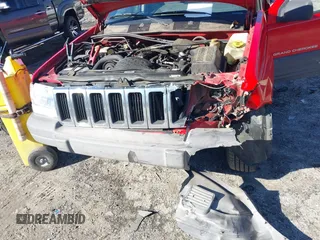 1996 Jeep Grand Cherokee Laredo with VIN 1J4EX58S8TC122302, listed as a IAAI auction lot 41218573 with 195,392 mi miles. Bid and sale history available at carsss.com. Image 6.