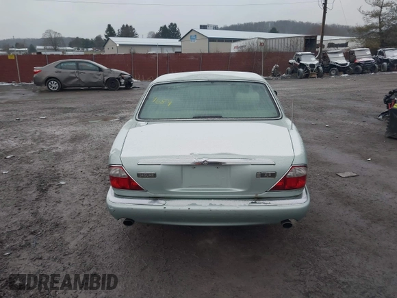 1998 Jaguar XJ with VIN SAJHN1242WC819689, listed as a IAAI auction lot 41148530 with 60,143 mi miles and . Bid and sale history available at DreamBid. Image 16.
