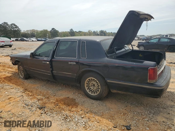 1997 Lincoln Town Car Executive z VIN 1LNLM81W6VY675388, wystawiony jako Copart lot #50345165 z przebiegiem 164 206 mil mil oraz Szkoda całkowita • Salvage title. Historia ofert i sprzedaży dostępna na DreamBid. Obrazek 2.