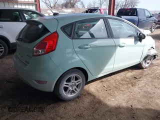 2017 Ford Fiesta SE with VIN 3FADP4EJ3HM172351, listed as a IAAI auction lot 41769567 with 86,948 mi miles. Bid and sale history available at carsss.com. Image 4.