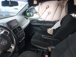 2015 Dodge Grand Caravan American Value with VIN 2C4RDGBGXFR682995, listed as a IAAI auction lot 41994708 with 142,725 mi miles and . Bid and sale history available at DreamBid. Image 5.