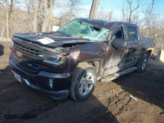 2016 Chevrolet Silverado 1500 LT with VIN 3GCUKRECXGG193508, listed as a IAAI auction lot 41498431 with 151,556 mi miles. Bid and sale history available at carsss.com. Image 2.
