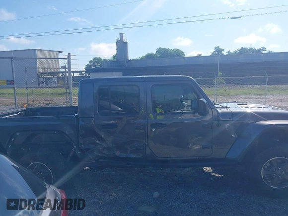 2021 Jeep Gladiator Rubicon z VIN 1C6JJTBG9ML592538, wystawiony jako IAAI lot #42206035 z przebiegiem 37 945 mil mil oraz . Historia ofert i sprzedaży dostępna na DreamBid. Obrazek 13.