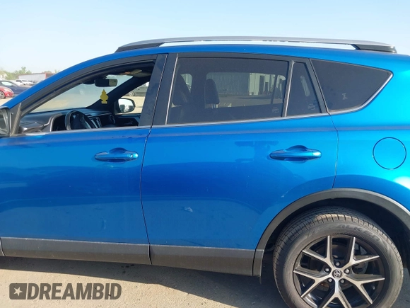 2018 Toyota RAV4 SE with VIN JTMNFREV3JJ156865, listed as a IAAI auction lot 41986697 with 124,979 mi miles and . Bid and sale history available at DreamBid. Image 15.