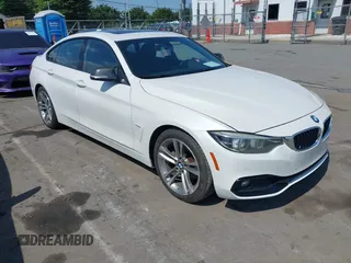2018 BMW 4 Series 430i with VIN WBA4J1C56JBM10509, listed as a IAAI auction lot 42469803 with 112,633 mi miles and . Bid and sale history available at DreamBid. Image 1.