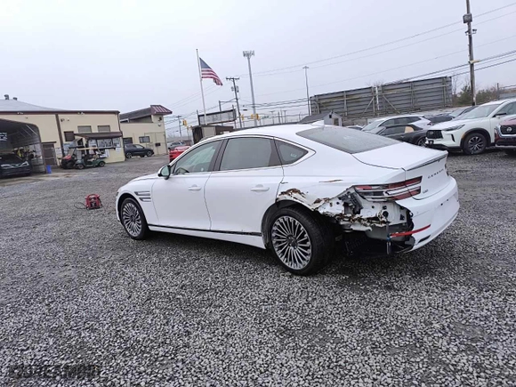 2023 Genesis Electrified G80 with VIN KMTGE4S11PU007105, listed as a Copart auction lot 49897265 with 5,283 mi miles and Clean Title. Bid and sale history available at carsss.com. Image 2.