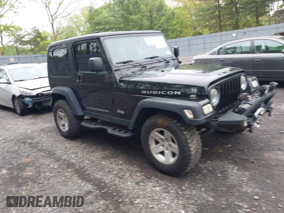 2006 Jeep Wrangler Rubicon z VIN 1J4FA69S76P749712, wystawiony jako IAAI lot #42240375 z przebiegiem 75 405 mil mil oraz . Historia ofert i sprzedaży dostępna na DreamBid. Obrazek 1.