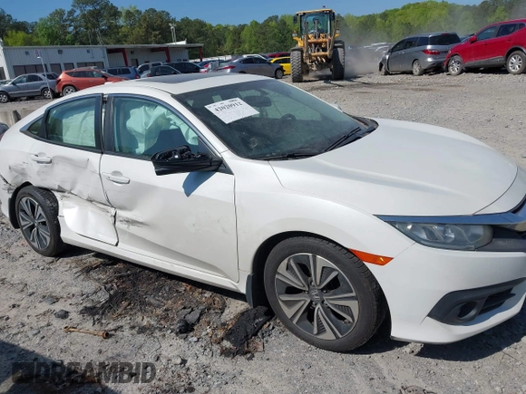 2018 Honda Civic EX-L z VIN 19XFC1F70JE000634, wystawiony jako IAAI lot #42020912 z przebiegiem 156 030 mil mil oraz . Historia ofert i sprzedaży dostępna na DreamBid. Obrazek 13.
