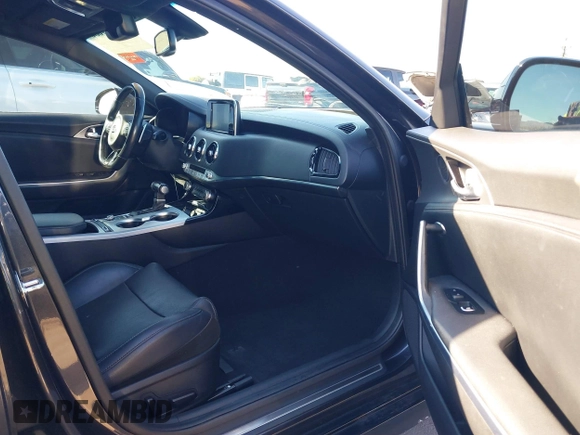 2019 Kia Stinger GT with VIN KNAE35LC3K6059198, listed as a IAAI auction lot 41599686 with 82,886 mi miles. Bid and sale history available at carsss.com. Image 5.