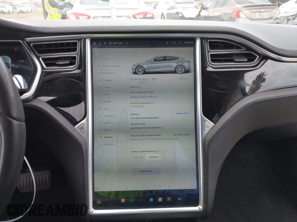2013 Tesla Model S with VIN 5YJSA1DG7DFP11382, listed as a IAAI auction lot 42056169 with 126,975 mi miles. Bid and sale history available at carsss.com. Image 7.
