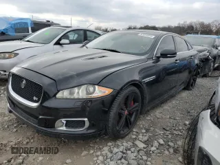 2014 Jaguar XJ with VIN SAJWA2EKXEMV64494, listed as a Copart auction lot 82634004 with 119,811 mi miles and Clean title. Bid and sale history available at DreamBid. Image 1.