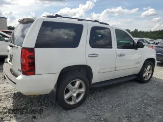 2011 Chevrolet Tahoe LS with VIN 1GNSCAE08BR394917, listed as a Copart auction lot 60470395 with 143,824 mi miles and Salvage title. Bid and sale history available at DreamBid. Image 3.