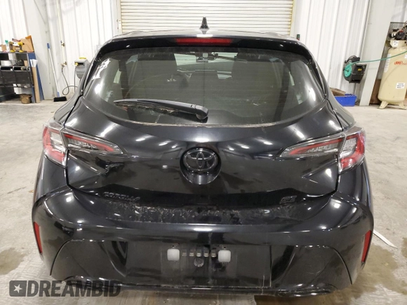 2021 Toyota Corolla SE with VIN JTND4MBE9M3122359, listed as a Copart auction lot 77909354 with 53,805 mi miles and Salvage Title. Bid and sale history available at DreamBid. Image 6.
