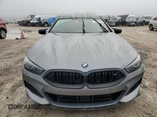 2023 BMW 8 Series M850i z VIN WBAGV8C02PCL20503, wystawiony jako Copart lot #84214214 z przebiegiem Nie podano mil oraz Szkoda całkowita • Salvage title. Historia ofert i sprzedaży dostępna na DreamBid. Obrazek 5.