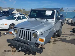 2004 Jeep Wrangler Rubicon with VIN 1J4FA69S94P701660, listed as a IAAI auction lot 41699554 with 74,640 mi miles. Bid and sale history available at carsss.com. Image 18.