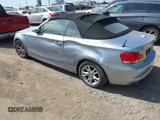 2008 BMW 1 Series 128i with VIN WBAUL73558VJ74120, listed as a IAAI auction lot 42071753 with 180,709 mi miles and . Bid and sale history available at carsss.com. Image 3.