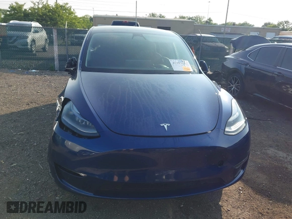 2023 Tesla Model Y Long Range with VIN 7SAYGDEE0PF671726, listed as a IAAI auction lot 42393616 with Not provided miles and . Bid and sale history available at DreamBid. Image 12.