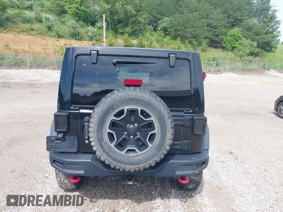 2017 Jeep Wrangler Unlimited Rubicon Recon z VIN 1C4HJWFG4HL507601, wystawiony jako IAAI lot #42258921 z przebiegiem 106 122 mil mil oraz . Historia ofert i sprzedaży dostępna na DreamBid. Obrazek 17.