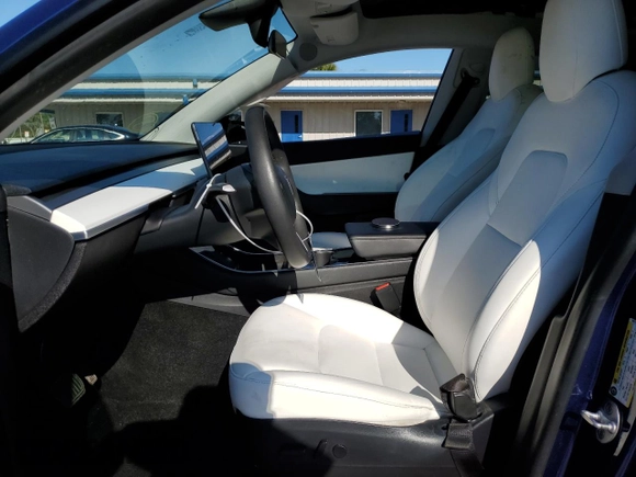 2020 Tesla Model Y Long Range with VIN 5YJYGDEE8LF034719, listed as a Copart auction lot 50888365 with 55,307 mi miles and Salvage Title. Bid and sale history available at DreamBid. Image 7.