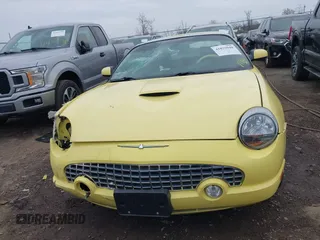 2002 Ford Thunderbird w/Hardtop Premium with VIN 1FAHP60A52Y105685, listed as a IAAI auction lot 41879044 with 116,772 mi miles. Bid and sale history available at carsss.com. Image 12.
