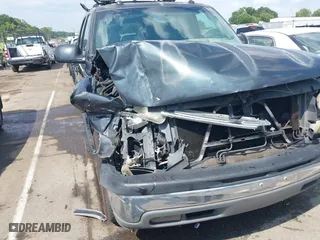 2004 Chevrolet Tahoe LT with VIN 1GNEC13Z04J134981, listed as a IAAI auction lot 39886652 with 244,056 mi miles. Bid and sale history available at carsss.com. Image 6.